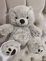 OURSON EN PELUCHE